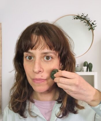 Gua sha mushroom along cheek